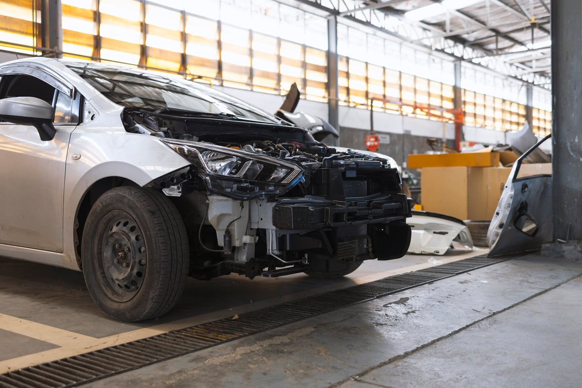 Collision repair - damaged car being repaired